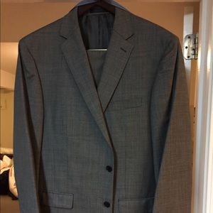 Men’s suit. 100% wool. Black/white